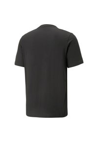 Camiseta negra de manga corta con cuello redondo. Fabricada con tejido suave, cuenta con una textura lisa y un diseño simple sin logotipos ni patrones visibles.