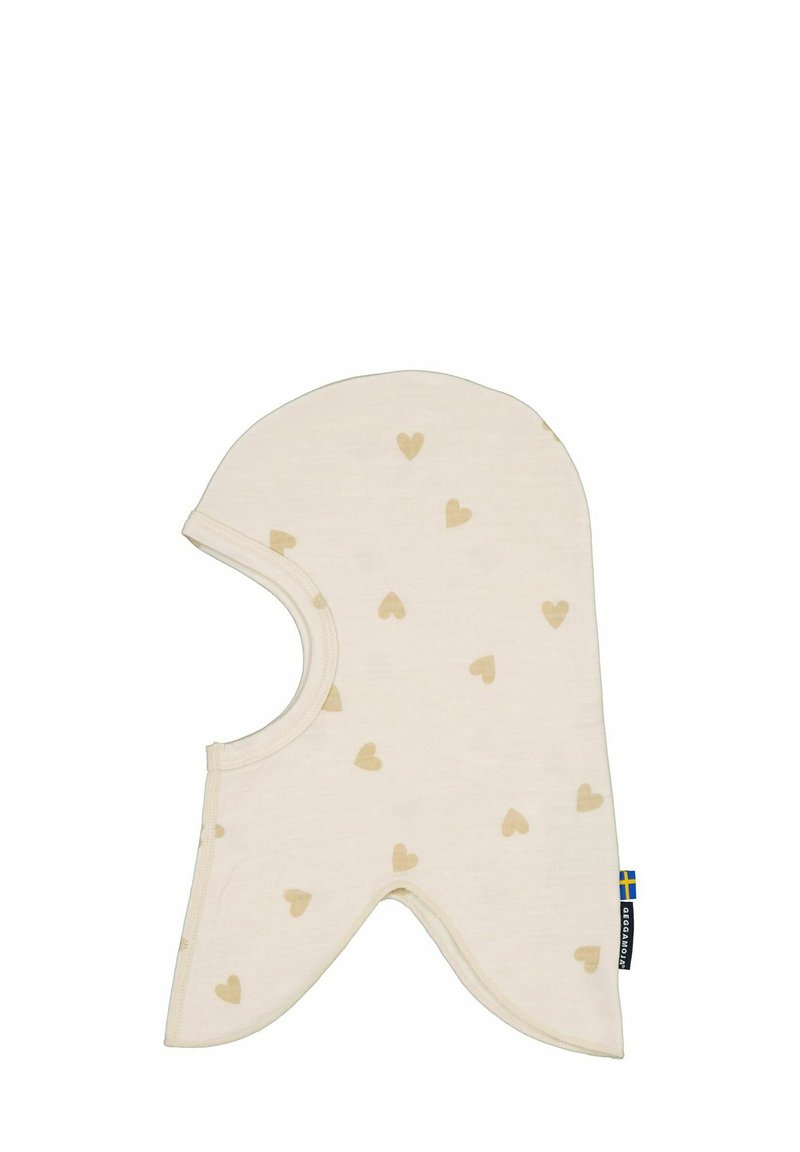 Ljusbeige hatt med små bruna hjärt-mönster, mjukt tyg, rundad topp, förlängda sidor och en cirkulär öppning för ansiktet.