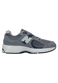 Gray athletic shoe with a mesh upper, suede accents, and a white midsole. Features a rounded toe and textured rubber outsole.