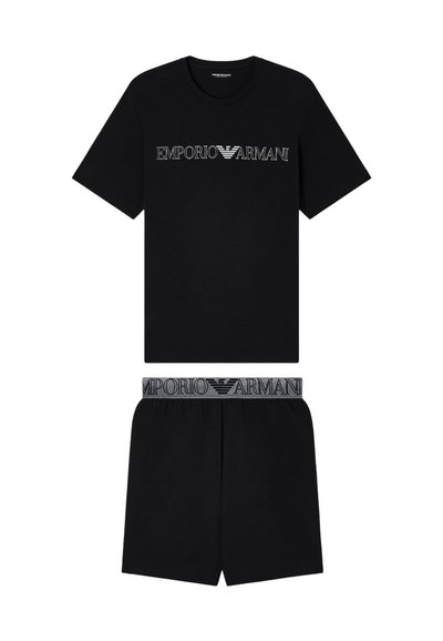 Σετ μαύρο κοντομάνικο T-shirt και σορτς με λογότυπο "EMPORIO ARMANI" στο στήθος και τη μέση σε λευκό και γκρι.