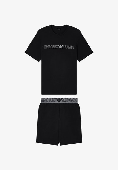 Σετ μαύρο κοντομάνικο T-shirt και σορτς με λογότυπο "EMPORIO ARMANI" στο στήθος και τη μέση σε λευκό και γκρι.