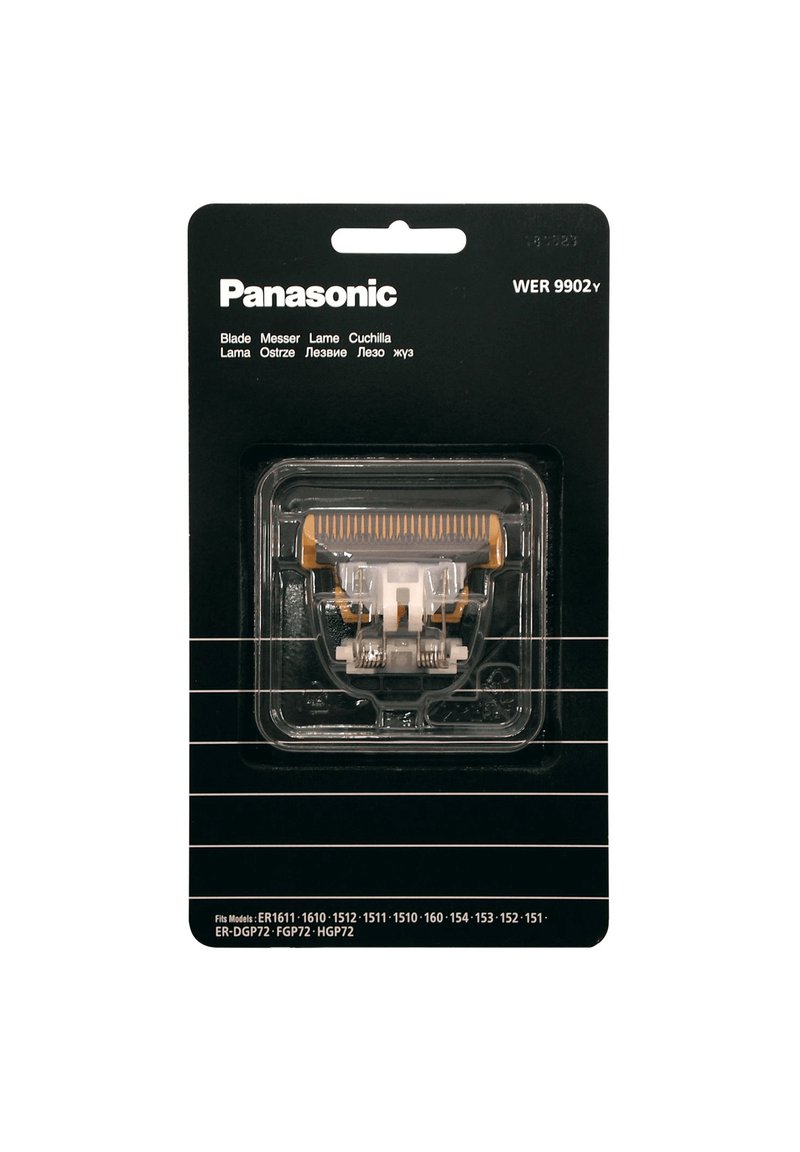 Panasonic mes in transparante verpakking met een witte en oranje kam. Zwarte achtergrond, inclusief meertalig tekst voor productidentificatie.