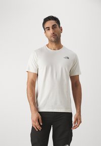 The North Face BOX - T-shirt imprimé - white dune/blue dusk
