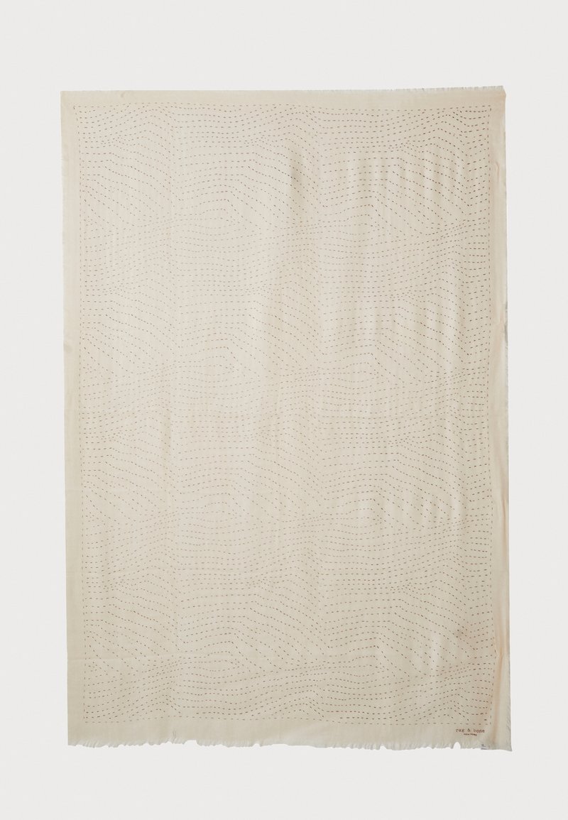Beige Stoff mit einem Wellenmuster, das durch gepunktete Linien erzeugt wird, mit einem Fransenrand. Weiche Textur, leicht und ideal zum Schichten.
