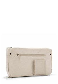Borsa a tracolla in tessuto beige con chiusura a zip, dotata di una tasca frontale con zip e una tasca laterale per ulteriore spazio di stivaggio.