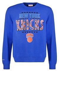 Felpa blu con scollatura rotonda. Presenta una stampa grafica "NEW YORK KNICKS" e un logo di pallacanestro in colori a contrasto. Tessuto morbido.