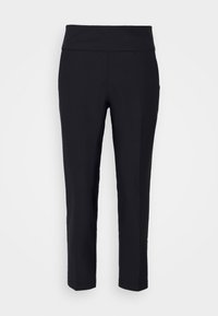 Černé elastické legíny s širokým hladkým pasem a zúženými nohavicemi, které mají minimalistický design bez viditelných vzorů nebo akcentů.