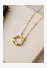 Ikke valgt, gold coloured