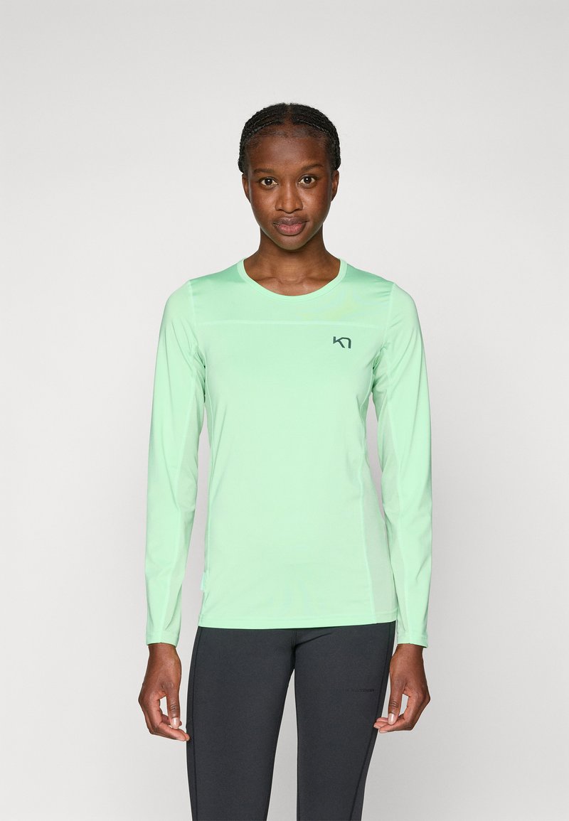 Miętowozielona koszulka sportowa z długim rękawem, wykonana z lekkiego materiału, z okrągłym dekoltem i logo na lewej piersi.