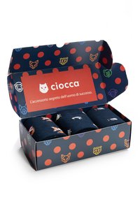 Marine sokken met dierillustraties zijn verpakt in een blauwe doos met rode stippen en een rood label met de tekst "ciocca."