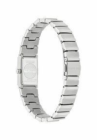 Orologio in acciaio inossidabile con quadrante rettangolare, design a bracciale con maglie e fondo decorato. Include una corona ed è resistente all'acqua fino a 50m.