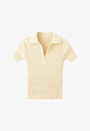 Bluză tricotată cu mâneci scurte, de culoare crem, cu textură zigzag și guler larg cu decolteu adânc în V.