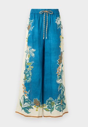 Pantalon large bleu avec des motifs floraux de bordure en vert, orange et blanc, doté d'une taille élastique et d'un cordon de serrage rayé.