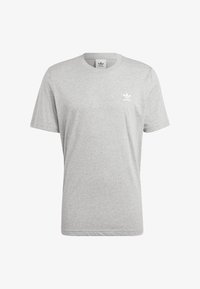 Šedé bavlněné tričko s kulatým výstřihem a krátkými rukávy. Na levé části hrudi se nachází malé bílé logo Adidas. Měkká textura.