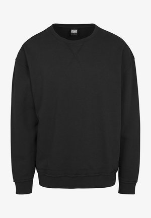 Musthave tumepehmus mustriga ja pikkade varrukatega, ribatud mansettide ja vöökohtadega, valmistatud pehmest puuvillasegusest kangast. Ilma graafika või mustriteta.