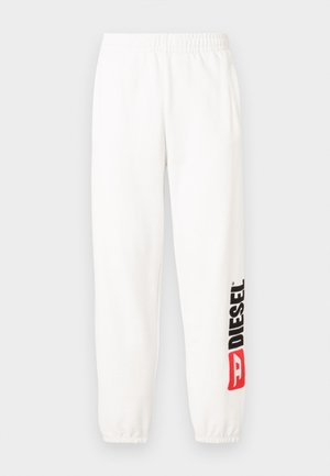 Balti kokvilnas sporta bikses ar elastīgu jostu. Kreisajā kājā ir melns un sarkans "DIESEL" logotips. Ar aprocēm pie potītēm. Gluda tekstūra.