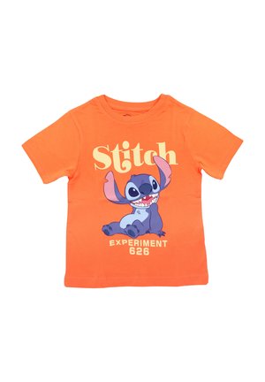 Orange bomull T-shirt med en grafisk bild av en blå karaktär med stora öron, texten "Stitch" och "EXPERIMENT 626" i gult. Korta ärmar, rund hals.