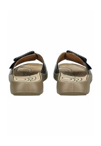 Black textured sandals with a beige sole, open back, and adjustable strap. Suede footbed features a circular logo design.