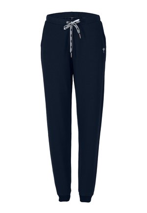Granatowe spodnie dresowe o zwężanym kroju z elastycznym pasem, białym sznurkiem z logo, kieszeniami po bokach oraz ściągaczami przy kostkach.