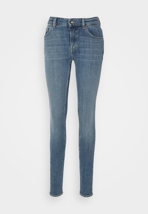 Niebieskie jeansy slim fit z pięcioma kieszeniami, zapięciem na guzik i wyblakłymi detalami z przodu i na nogawkach.