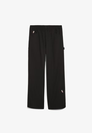 Mustat püksid elastse vööga, kahe esipocketiga ja väikese tikandiga alumises sääres. Valmistatud kergest materjalist.