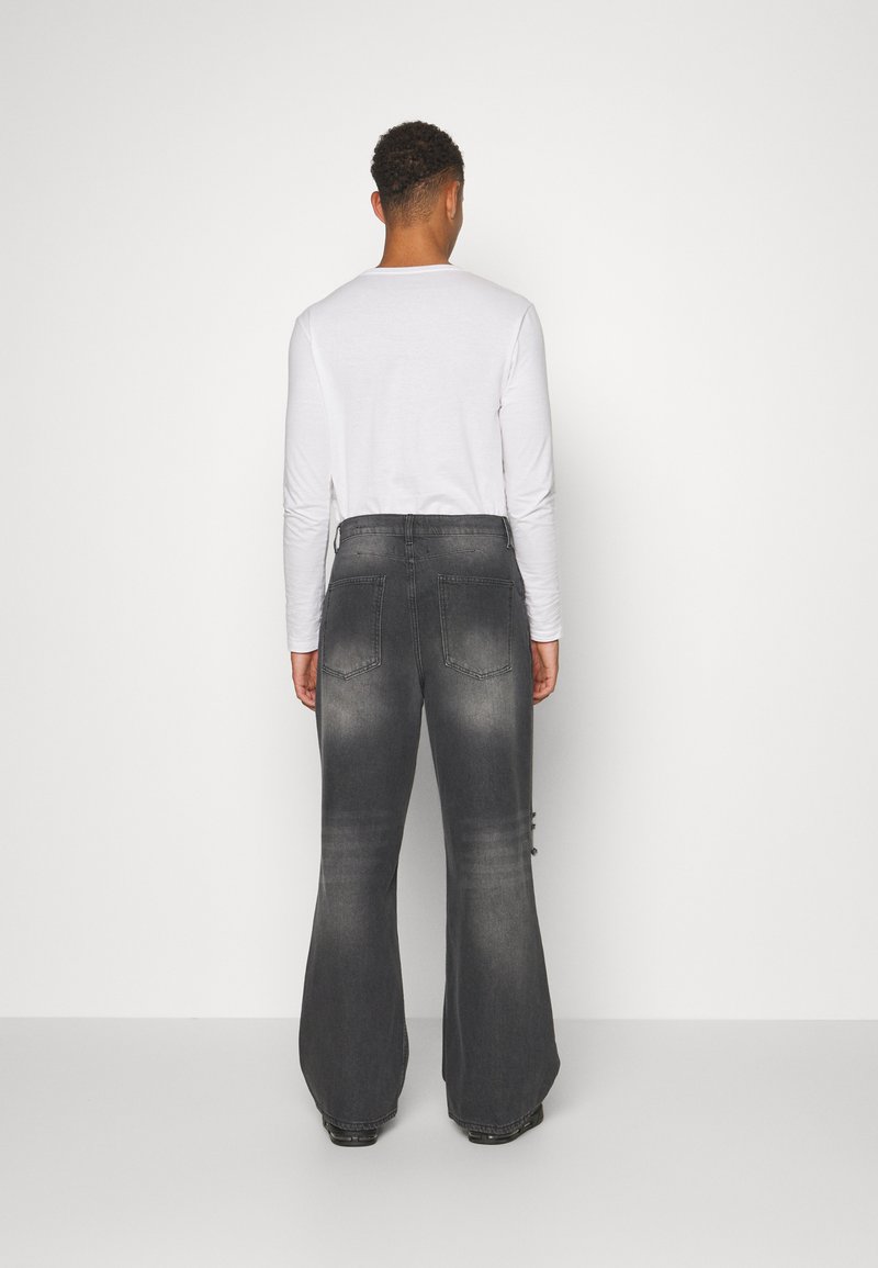 Jaded London BUSTED FLARED COLOSSUS - Bootcut jeans - washed black 