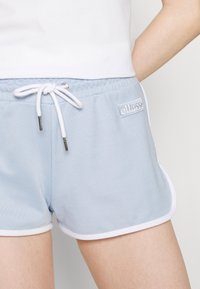 Ellesse Teplákové kalhoty - light blue