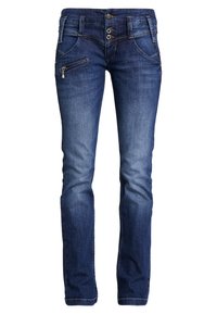 Kapeat siniset farkut haalistuneella tekstuurilla, vetoketjullinen taskudetalji edessä ja klassinen viiden taskun malli. Kaksinappinen suljenta.