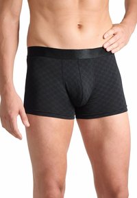 Boxer da uomo neri in tessuto morbido, con un sottile motivo geometrico, vita elastica e design a gamba corta.