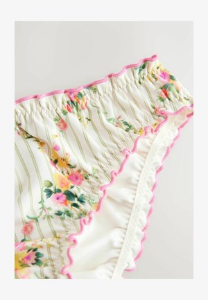 Valkoinen bikinitoppi, jossa on vaaleanpunaiset röyhelöt, ja siinä on kukkakuosi pinkeillä ja keltaisilla väreillä vihreillä raidoilla. Sileä kangas.