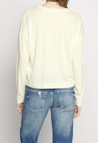 DRYKORN Pitkähihainen paita - off-white