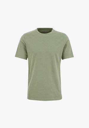 Roheline puuvillane t-särk lühikeste varrukatega, ümar kaelus ja tavaline lõige. Sile tekstuur, mustrid puuduvad ja nähtavat riistvara pole.