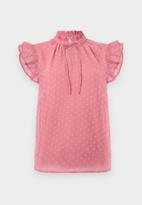 Top rosa a maniche corte realizzato in un tessuto testurizzato con pois. Presenta un collo alto a volant e una chiusura con fiocco davanti.