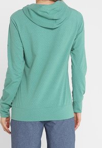 Vaude Felpa con cappuccio - green