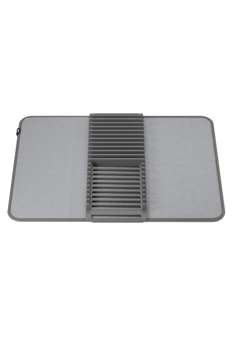 Graue Abtropfmatte mit strukturierter Oberfläche, die einen zentralen erhöhten Bereich mit Rillen zum Trocknen von Geschirr aufweist. Weiches, saugfähiges Material.