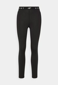 Svarta träningsleggings med ett elastiskt tyg, hög midja med "SPORT" i vit färg och en figurnära design.