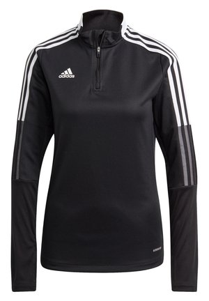 Haut de sport Adidas noir à manches longues avec bandes blanches aux épaules, col à fermeture éclair au quart et détails en mesh sur les manches.