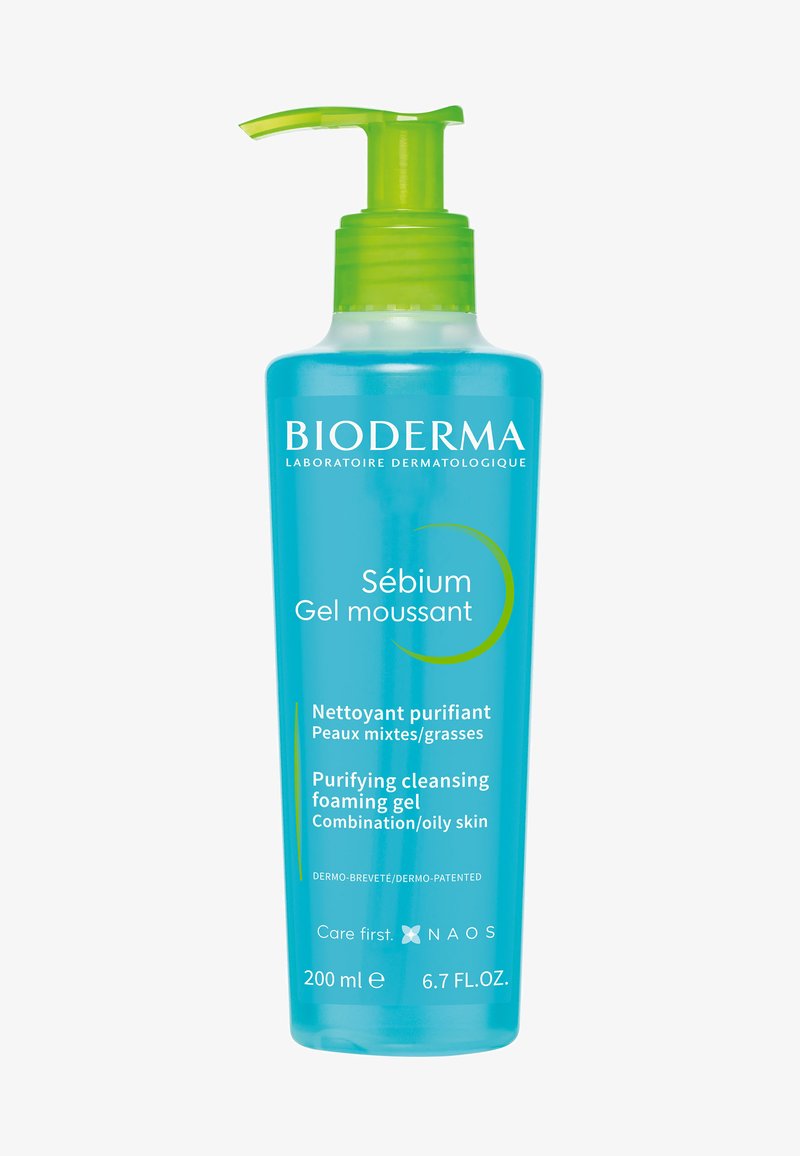 Clear plastic bottle with a green pump top, containing 200 ml of blue foaming gel. Label includes brand name and product details in white text.