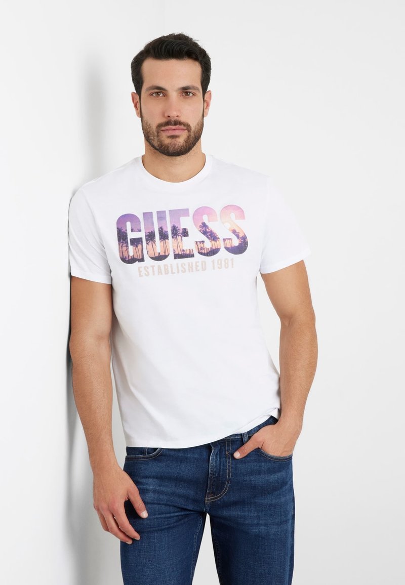 Guess T-shirt CN SS LOGO SEGQUINS TEE Bianco