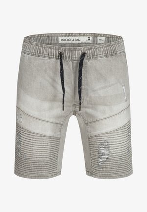Shorts en denim gris avec une taille élastique et un cordon de serrage noir. Comprend des panneaux côtelés et des accents usés à l'avant. Taille petite.