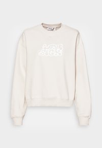 O sweatshirt de cor creme apresenta um gráfico texturizado de uma nuvem branca na parte da frente. O design inclui punhos e bainha canelados, com um decote redondo.