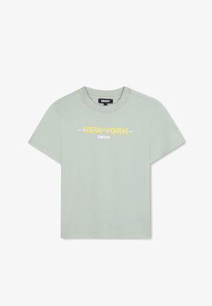 T-shirt en coton vert menthe à manches courtes, arborant l'inscription "NEW YORK" en lettres jaunes et blanches épaisses sur la poitrine. Encolure ronde.
