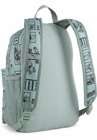 Zaino verde chiaro con schienale imbottito, tasca laterale in rete, spalline con motivo che presenta grafiche nere e chiusura regolabile con fibbia.