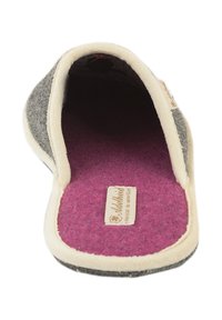 Gray and cream wool slipper with a soft pink felt insole, rounded toe shape, and a label on the inside. Non-slip outsole visible.