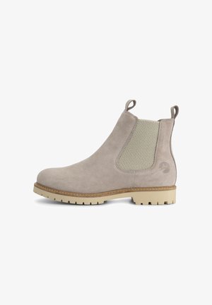 Lichtbeige suède Chelsea-laars met elastisch zijpaneel, aantreklusjes aan voor- en achterkant, en geribbelde rubberen zool.