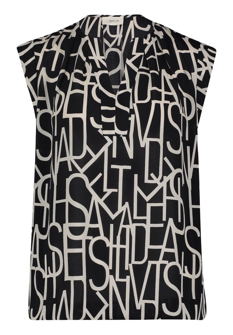 Blouse sans manches noire avec une coupe décontractée, ornée de grands motifs textuels blancs. Le détail du col plissé ajoute un intérêt visuel.