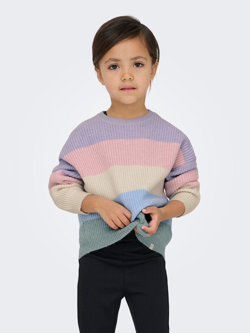 Colorful ribbed knit sweater with horizontal pastel stripes in purple, pink, blue, and green. Paired with black pants.