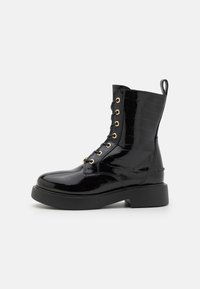 Love Moschino NEW CITY LOVE - Botas de tornozelo com plataforma - nero