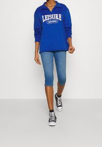 Vero Moda Jeansshorts - light-blue denim