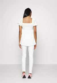 GAP Maternity Calças de ganga de corte skinny - white